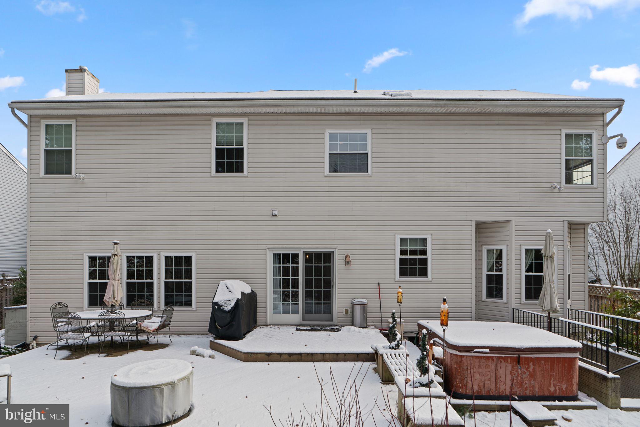 22 Dovefield Road Perry Hall, MD 21128 - Photo 41 of 46 a outdoor space with patio the couches and a fireplace