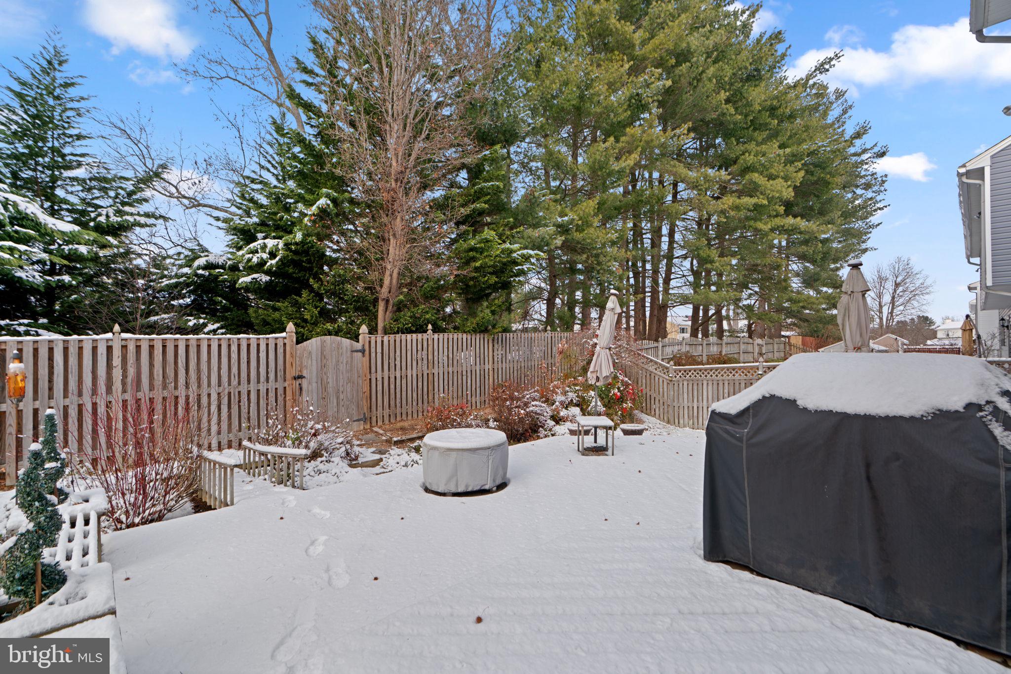 22 Dovefield Road Perry Hall, MD 21128 - Photo 43 of 46 a view of a patio with two chairs and a fire pit