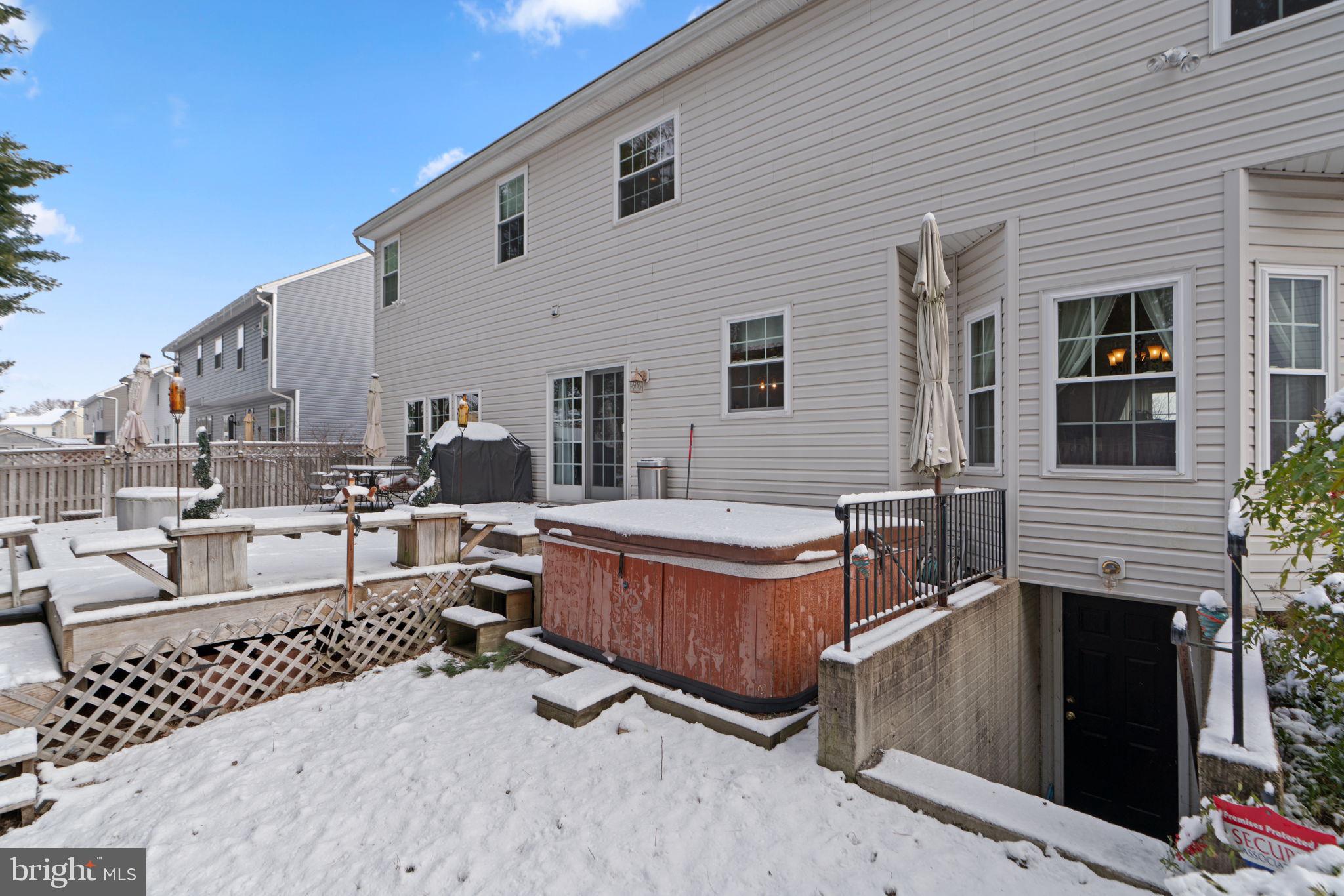 22 Dovefield Road Perry Hall, MD 21128 - Photo 45 of 46 a view of a chairs and tables in the back yard of the house