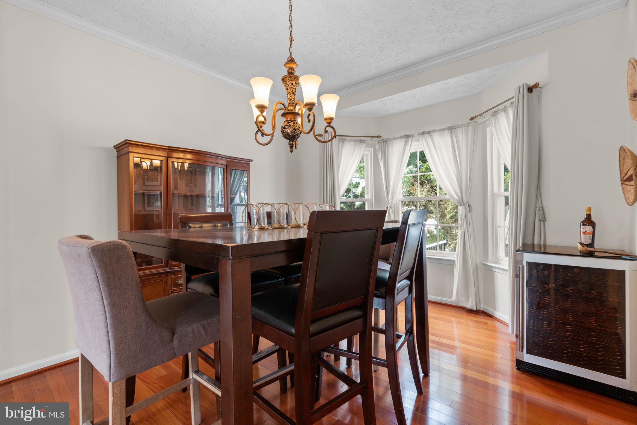 22 Dovefield Road Perry Hall, MD 21128 - Photo 6 of 46 a view of a dining room with furniture window and wooden floor