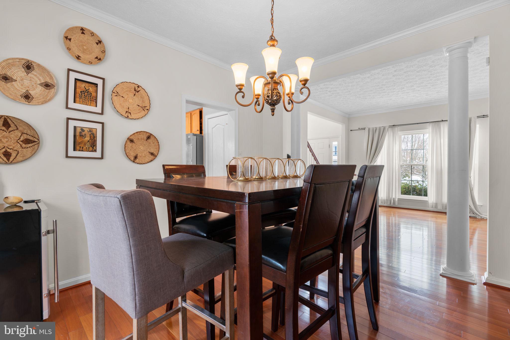 22 Dovefield Road Perry Hall, MD 21128 - Photo 7 of 46 a view of a dining room with furniture and wooden floor
