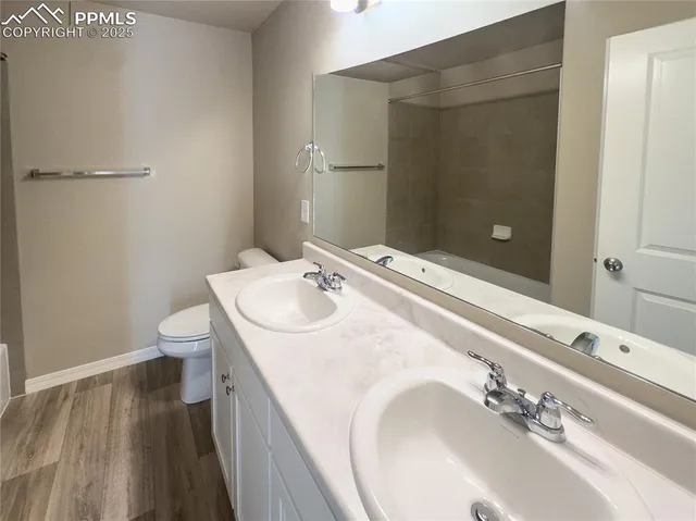 a view of a glass door with a floor to ceiling window next to a yard