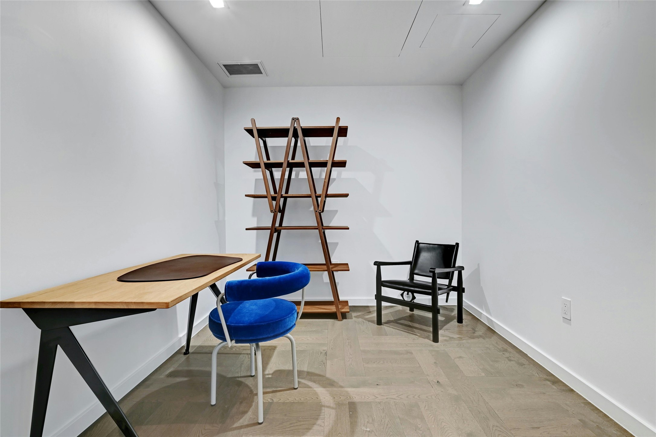 313 West 17th Street, Unit 2306 Austin, TX 78701 - Photo 4 of 35 The den area provides a versatile space that can be used for various purposes, adding to the overall functionality of the home. Furnishings provided by Scott + Cooner available for purchase separately.