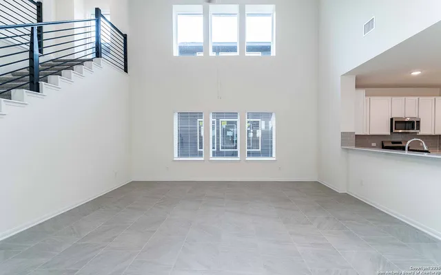 a view of livingroom with furniture and windows