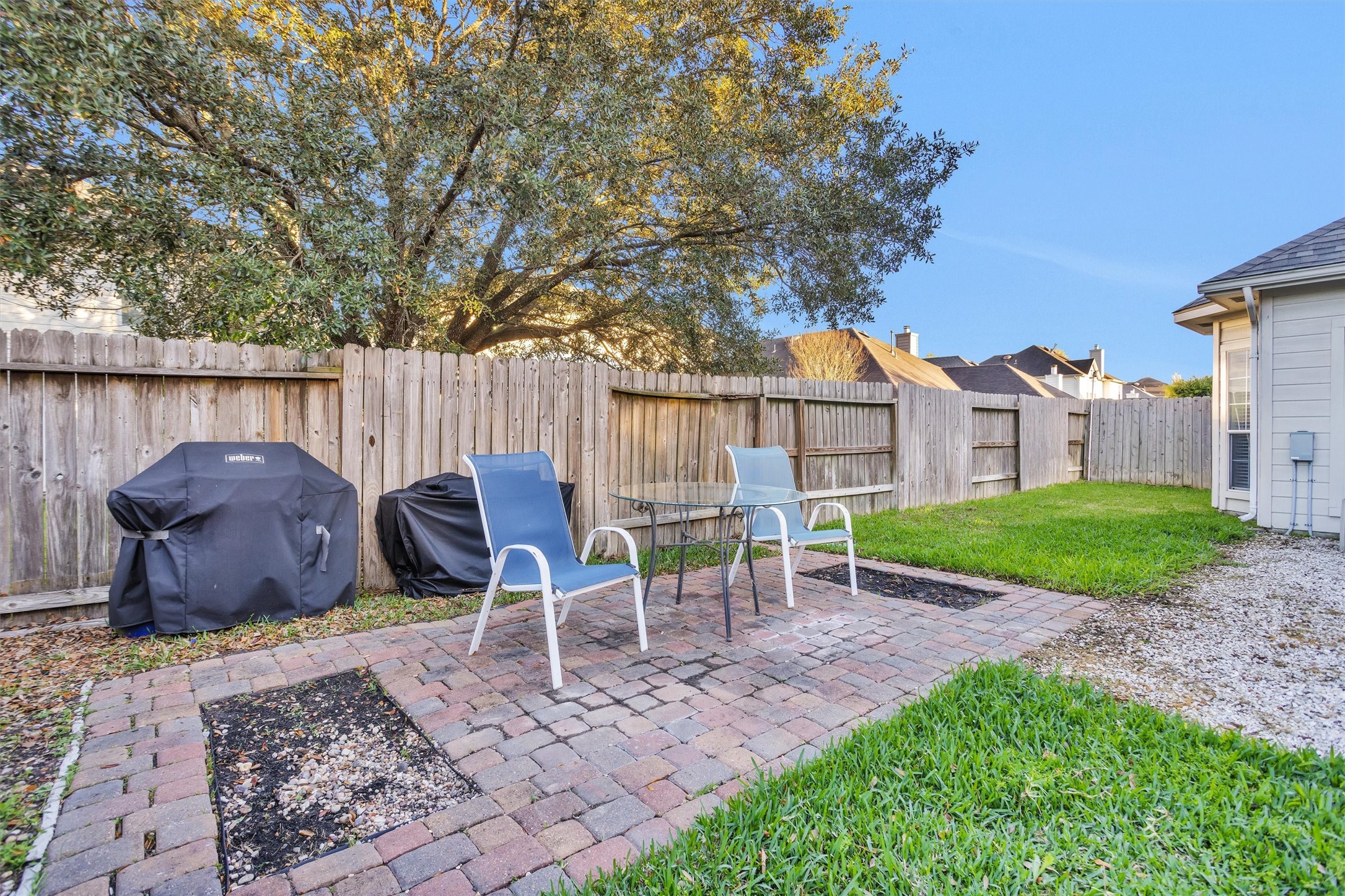 30110 Legends Ridge Drive Spring, TX 77386 - Photo 48 of 49 a view of a chair and table in backyard
