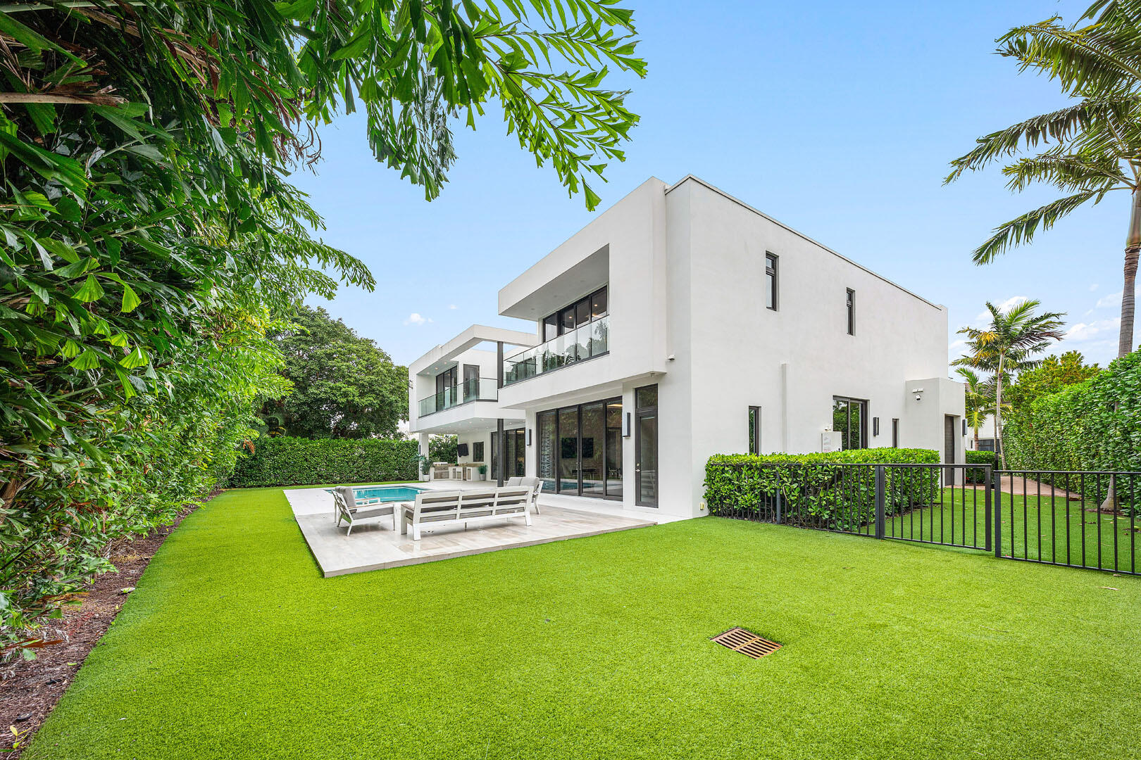 2391 Areca Palm Road Boca Raton, FL 33432 - Photo 36 of 82 a house view with a garden space