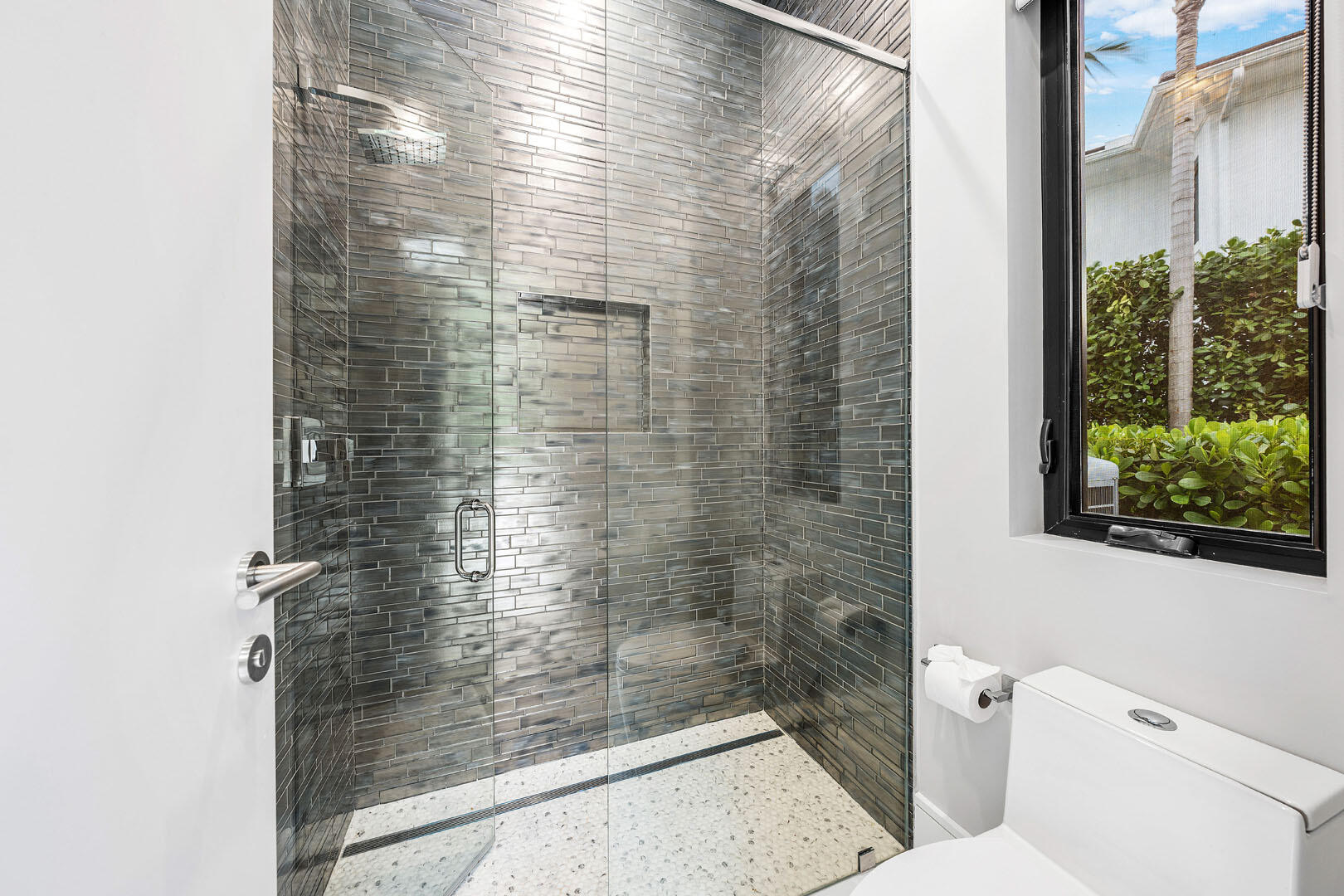 2391 Areca Palm Road Boca Raton, FL 33432 - Photo 41 of 82 a bathroom with a shower and a toilet