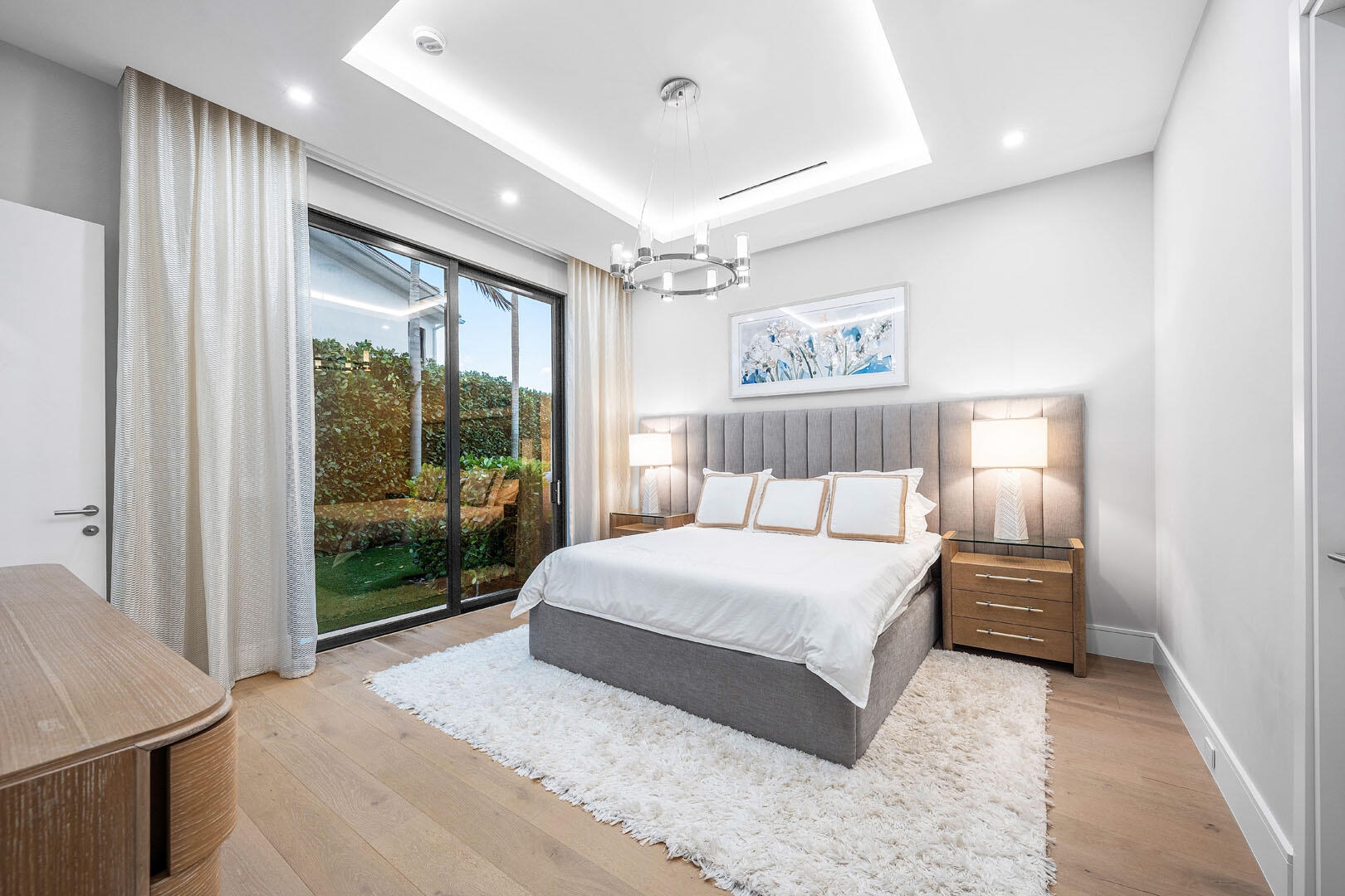 2391 Areca Palm Road Boca Raton, FL 33432 - Photo 42 of 82 a bedroom with a large bed and a large window