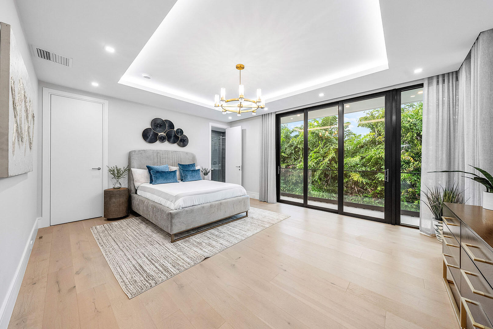 2391 Areca Palm Road Boca Raton, FL 33432 - Photo 65 of 82 a bedroom with a large bed and a large window