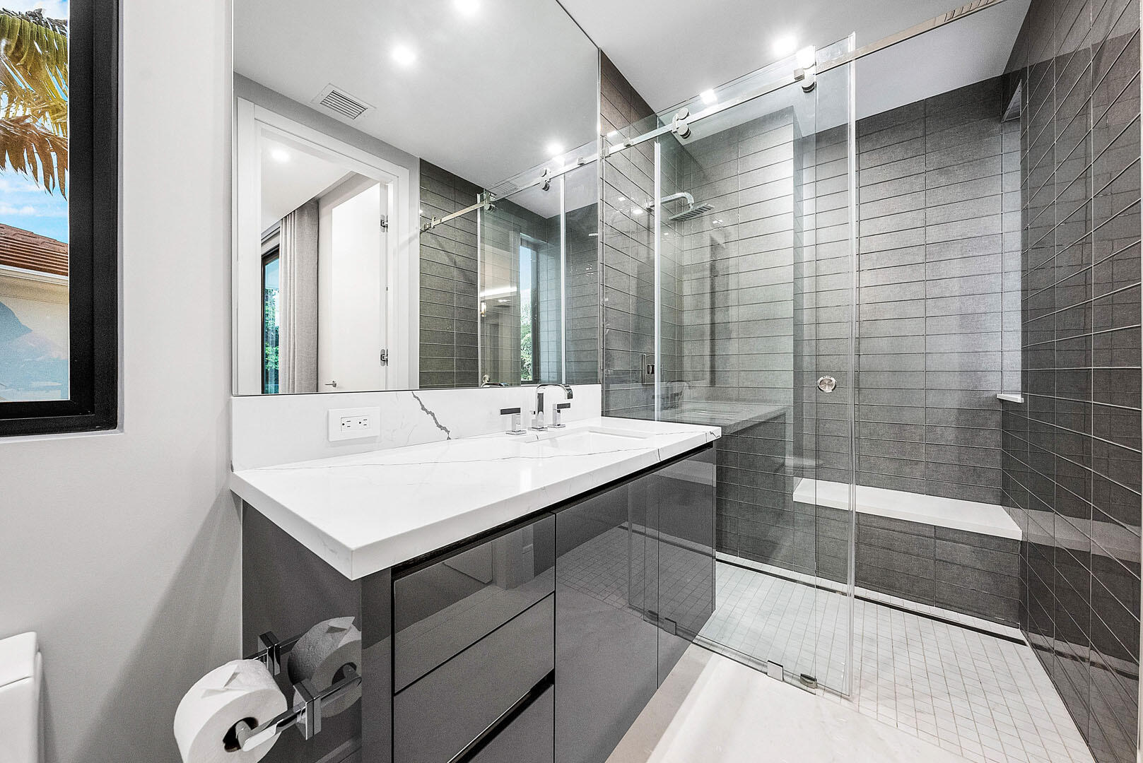 2391 Areca Palm Road Boca Raton, FL 33432 - Photo 66 of 82 a bathroom with a sink and mirror