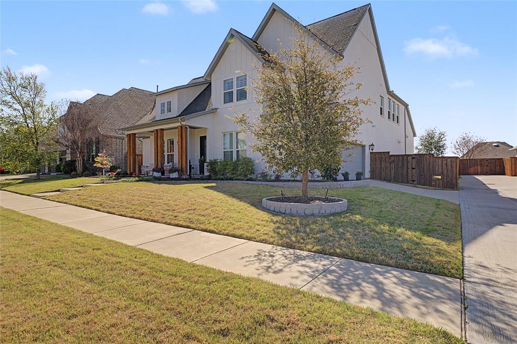 13753 Green Elm Road Fort Worth, TX 76008 - Photo 6 of 40 View of front of property featuring covered porch, driveway, and an attached garage