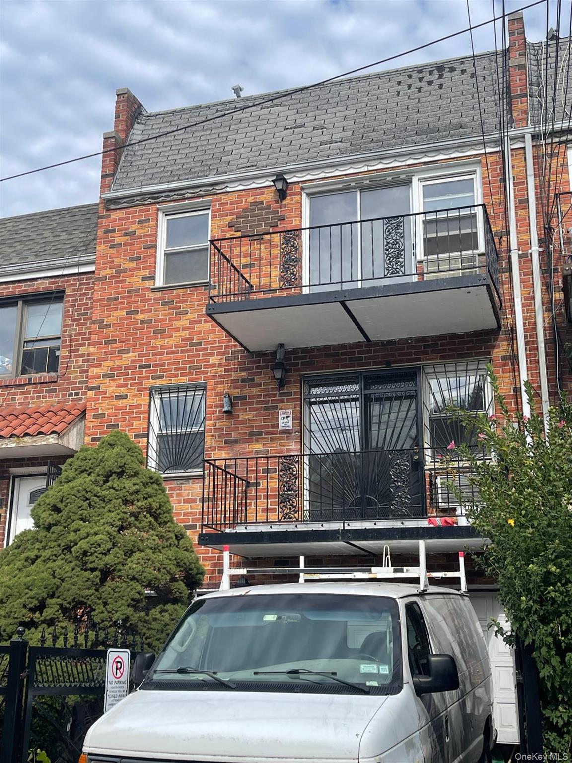 110-21 55th Avenue Queens, NY 11368 - Photo 2 of 29 a view of house with a large window and potted plants