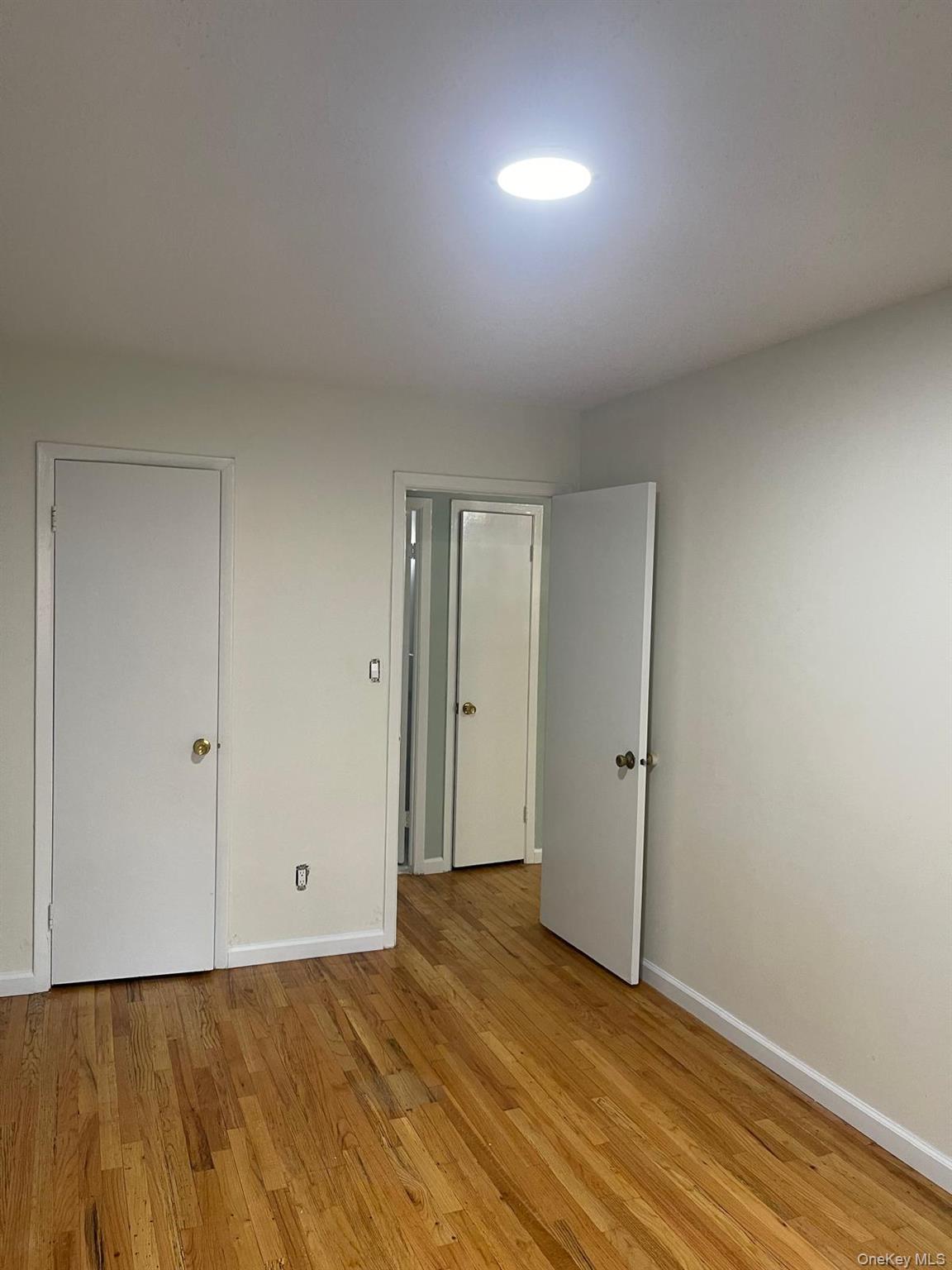 110-21 55th Avenue Queens, NY 11368 - Photo 9 of 29 a view of an empty room