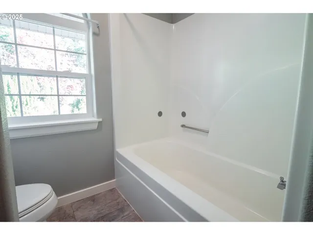 a bathroom with a bathtub