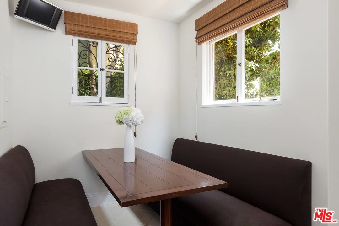703 Palisades Beach Road Santa Monica, CA 90402 - Photo 18 of 37 a view of a workspace room with a window