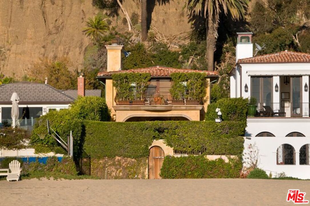 703 Palisades Beach Road Santa Monica, CA 90402 - Photo 2 of 37 front view of a house with a street