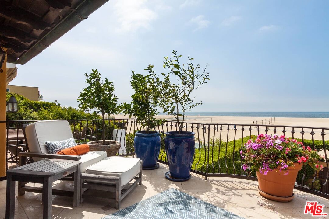 703 Palisades Beach Road Santa Monica, CA 90402 - Photo 29 of 37 a outdoor living space with furniture and potted plants