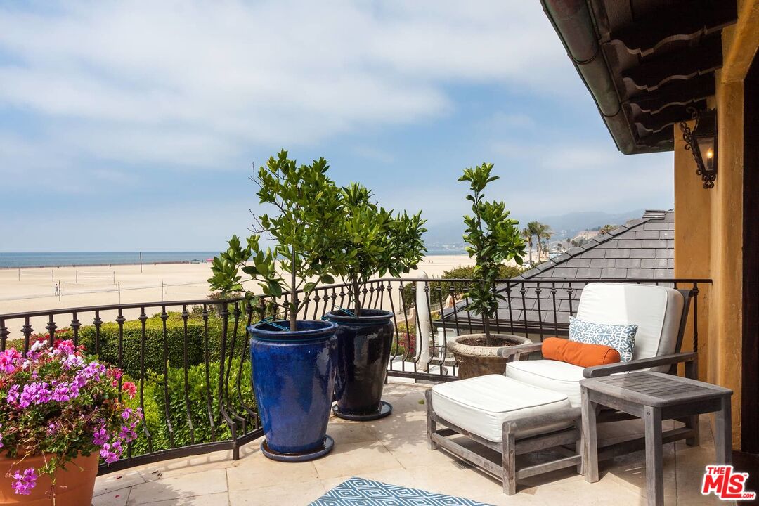703 Palisades Beach Road Santa Monica, CA 90402 - Photo 30 of 37 a view of balcony with chairs and potted plants