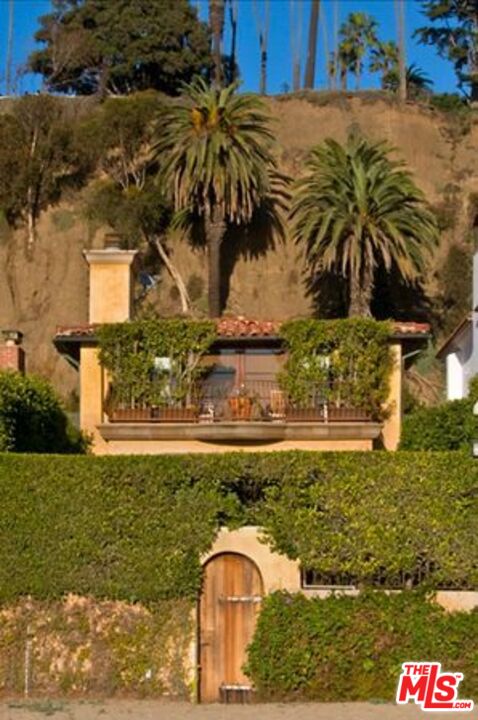703 Palisades Beach Road Santa Monica, CA 90402 - Photo 3 of 37 a view of swimming pool with a yard and seating area