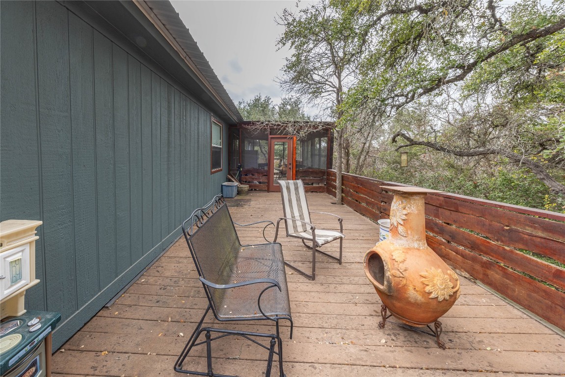 715 Bee Gee Road Driftwood, TX 78619 - Photo 36 of 40 a view of a chairs and tables in the balcony