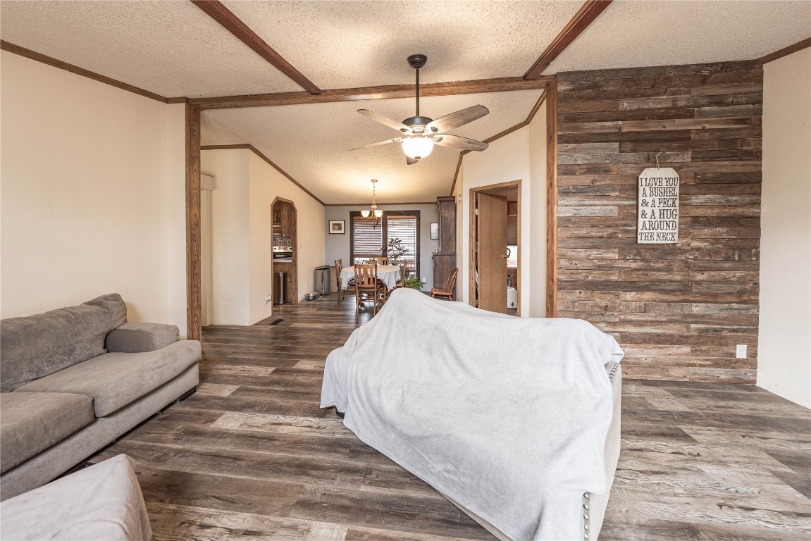 715 Bee Gee Road Driftwood, TX 78619 - Photo 6 of 40 a living room with furniture and a fireplace
