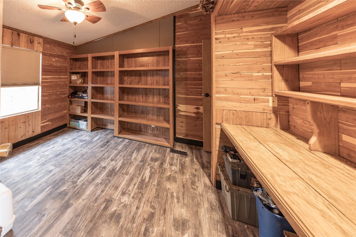 715 Bee Gee Road Driftwood, TX 78619 - Photo 8 of 40 a view of storage and utility room