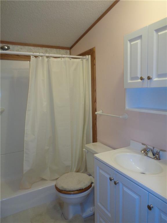 14 Ruby Drive Grove City, PA 16127 - Photo 17 of 17 a bathroom with a granite countertop sink toilet and shower