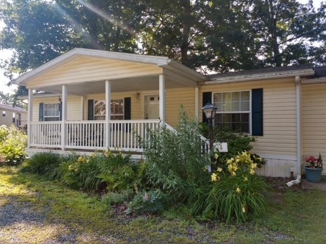 14 Ruby Drive Grove City, PA 16127 - Photo 2 of 17 a view of a house with a small yard and plants