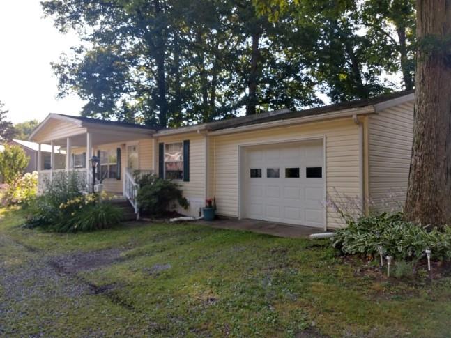 14 Ruby Drive Grove City, PA 16127 - Photo 4 of 17 a front view of house with yard and green space