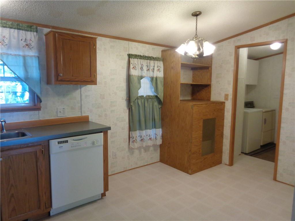 14 Ruby Drive Grove City, PA 16127 - Photo 6 of 17 a kitchen that has a lot of cabinets in it