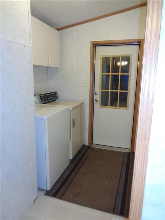 14 Ruby Drive Grove City, PA 16127 - Photo 8 of 17 a view of utility room with washer and dryer