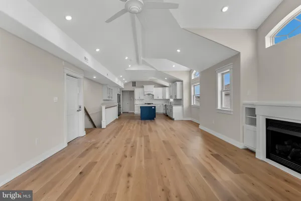 a view of a balcony with wooden floor
