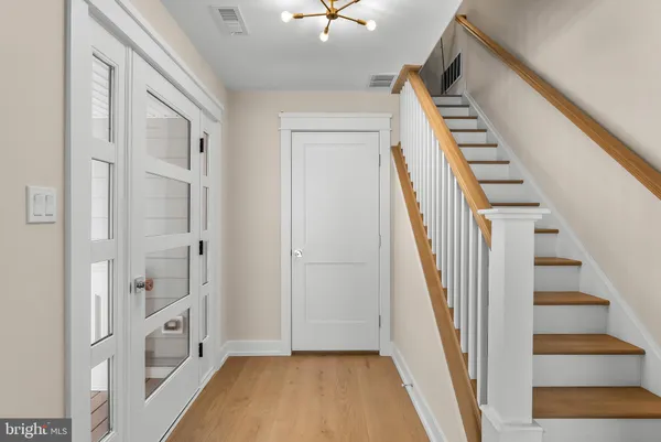 a view of an entryway with staircase