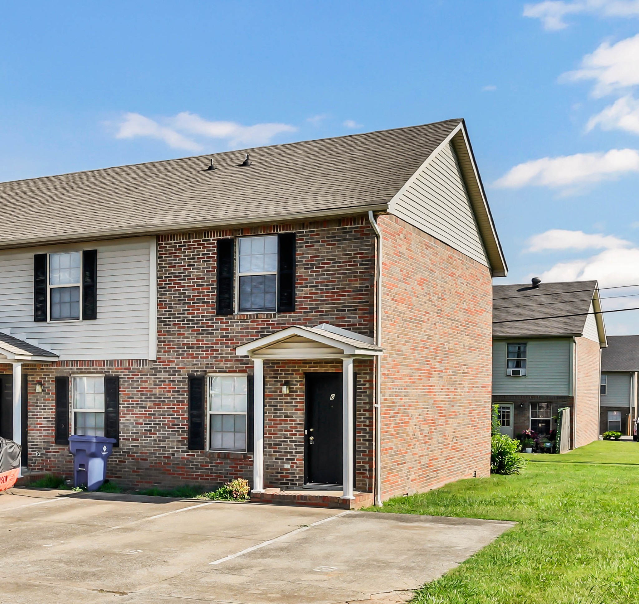 2451 Wilson Road, Unit 6 Clarksville, TN 37043 - Photo 17 of 21 a front view of a house with a yard