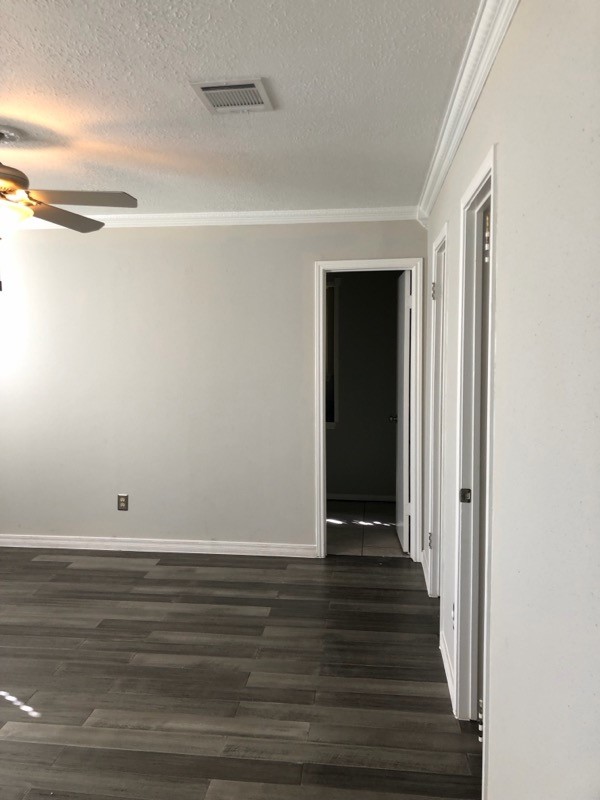 19707 Auburn Park Lane Spring, TX 77379 - Photo 7 of 16 a view of an empty room with wooden floor