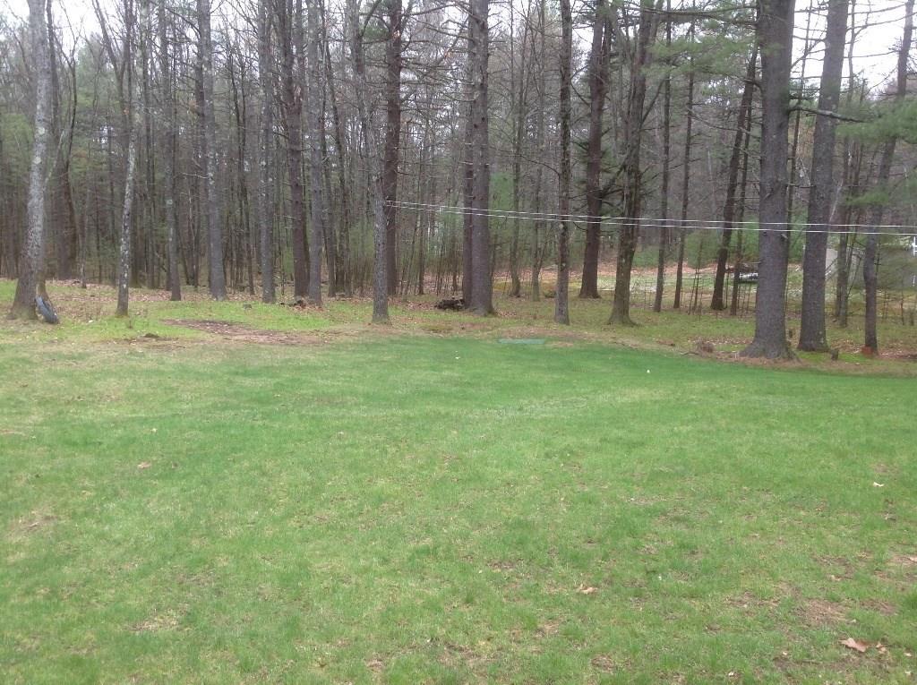17 Locksmith Lane Wells, ME 04090 - Photo 13 of 23 Nice quiet private rear yard, wood lined