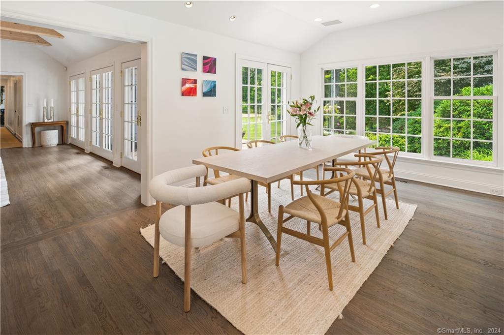 782 Smith Ridge Road New Canaan, CT 06840 - Photo 15 of 28 a view of a dining room with furniture window and outside view