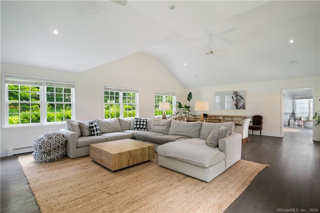 782 Smith Ridge Road New Canaan, CT 06840 - Photo 17 of 28 a living room with furniture and a large window