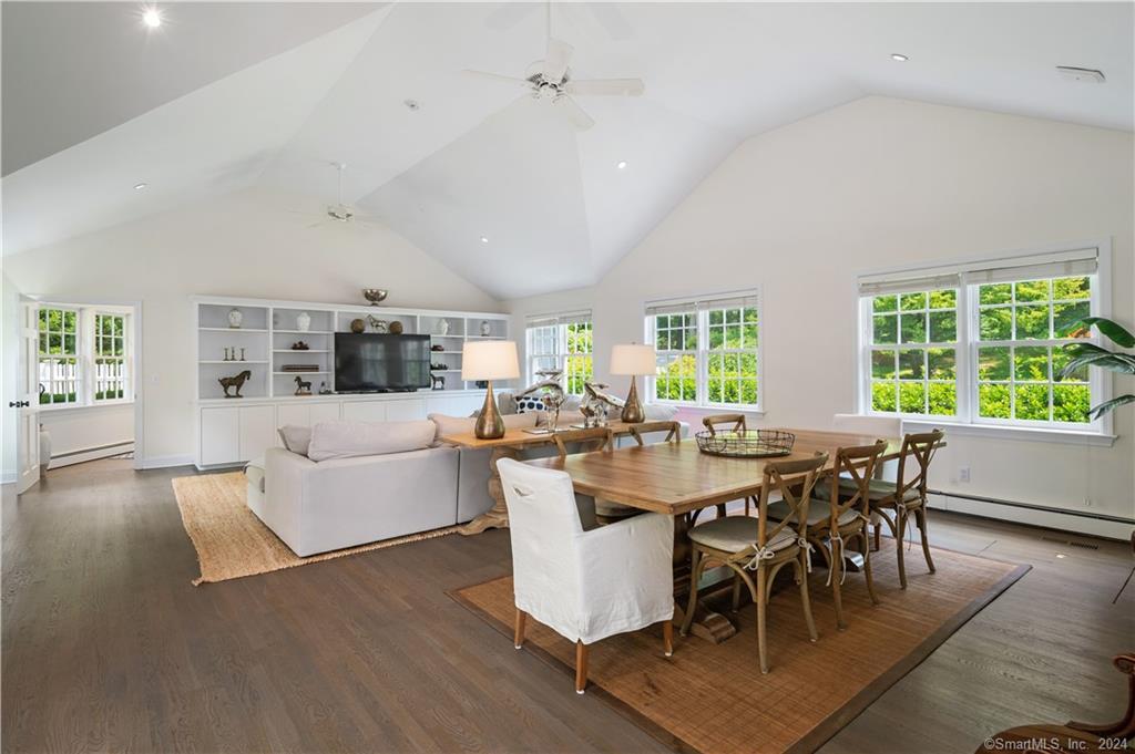 782 Smith Ridge Road New Canaan, CT 06840 - Photo 18 of 28 a view of a dining room with furniture and wooden floor
