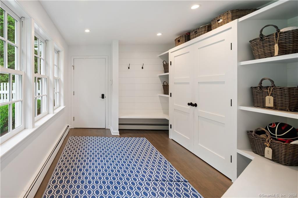 782 Smith Ridge Road New Canaan, CT 06840 - Photo 25 of 28 a bathroom with a sink and a shower