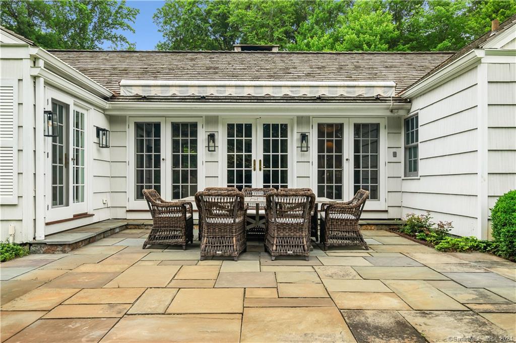 782 Smith Ridge Road New Canaan, CT 06840 - Photo 7 of 28 a view of house with outdoor seating space