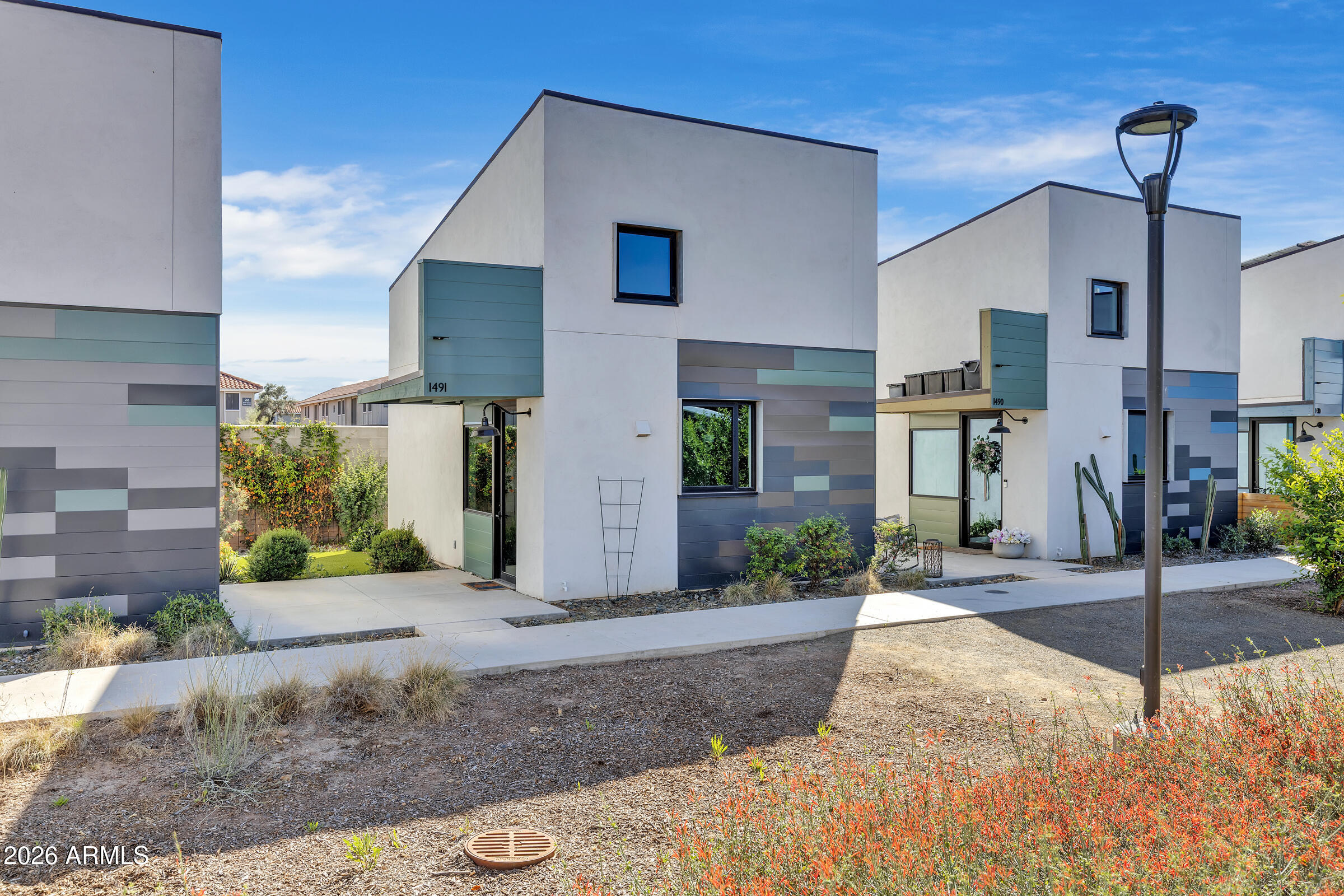 a view of a house with a street