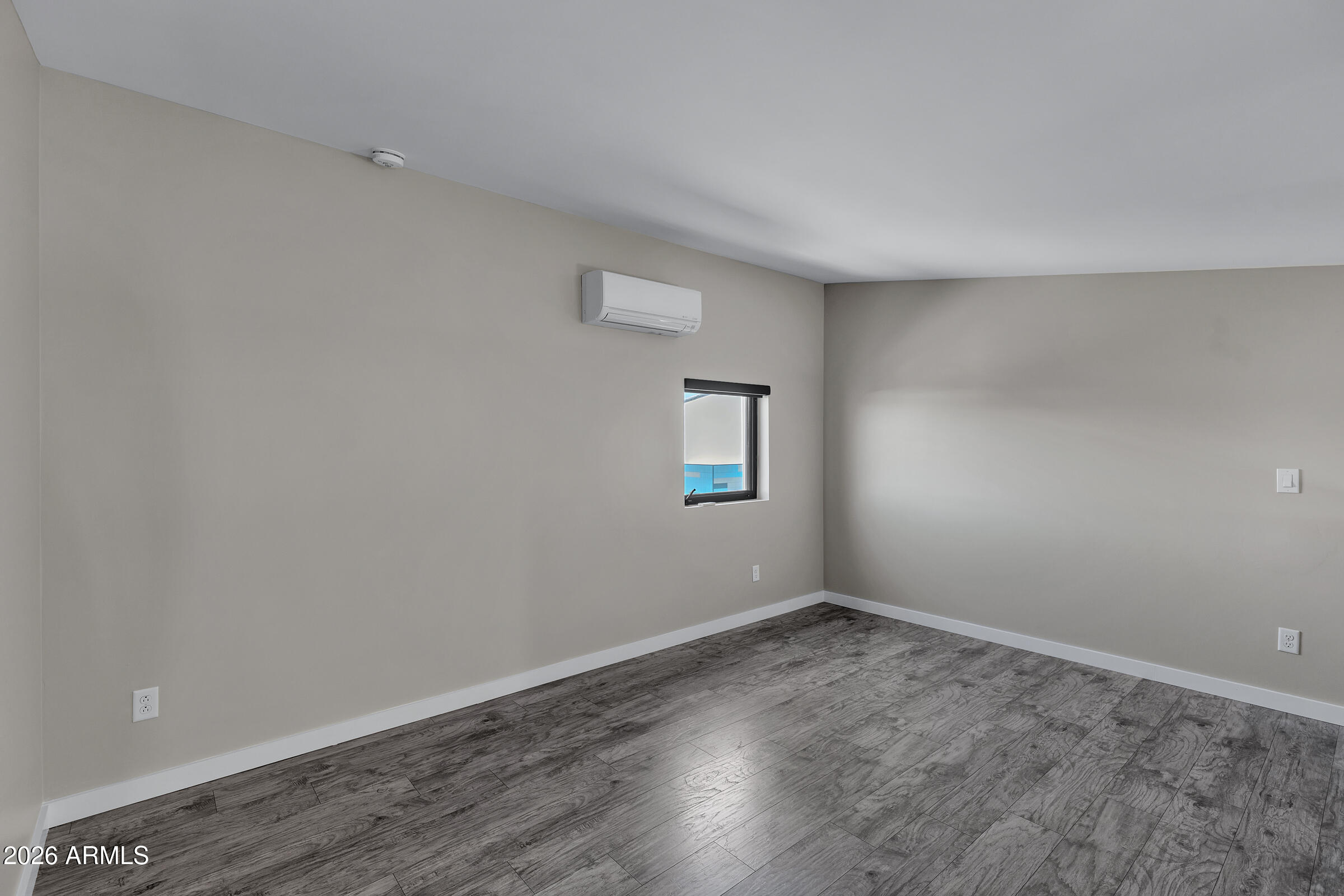 1491 South Rita Lane Tempe, AZ 85281 - Photo 13 of 15 wooden floor in an empty room