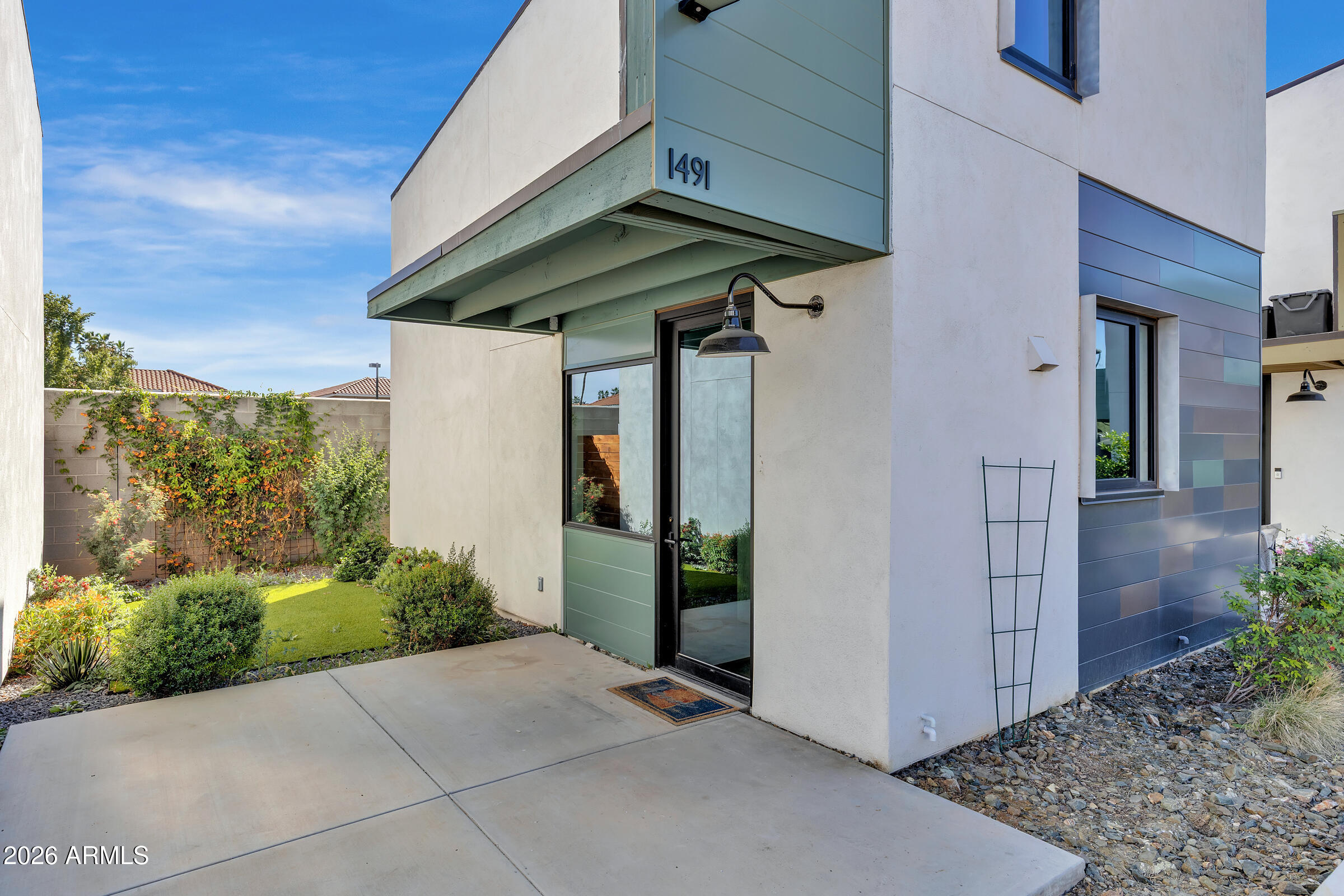1491 South Rita Lane Tempe, AZ 85281 - Photo 3 of 15 a view of a bird door of the house