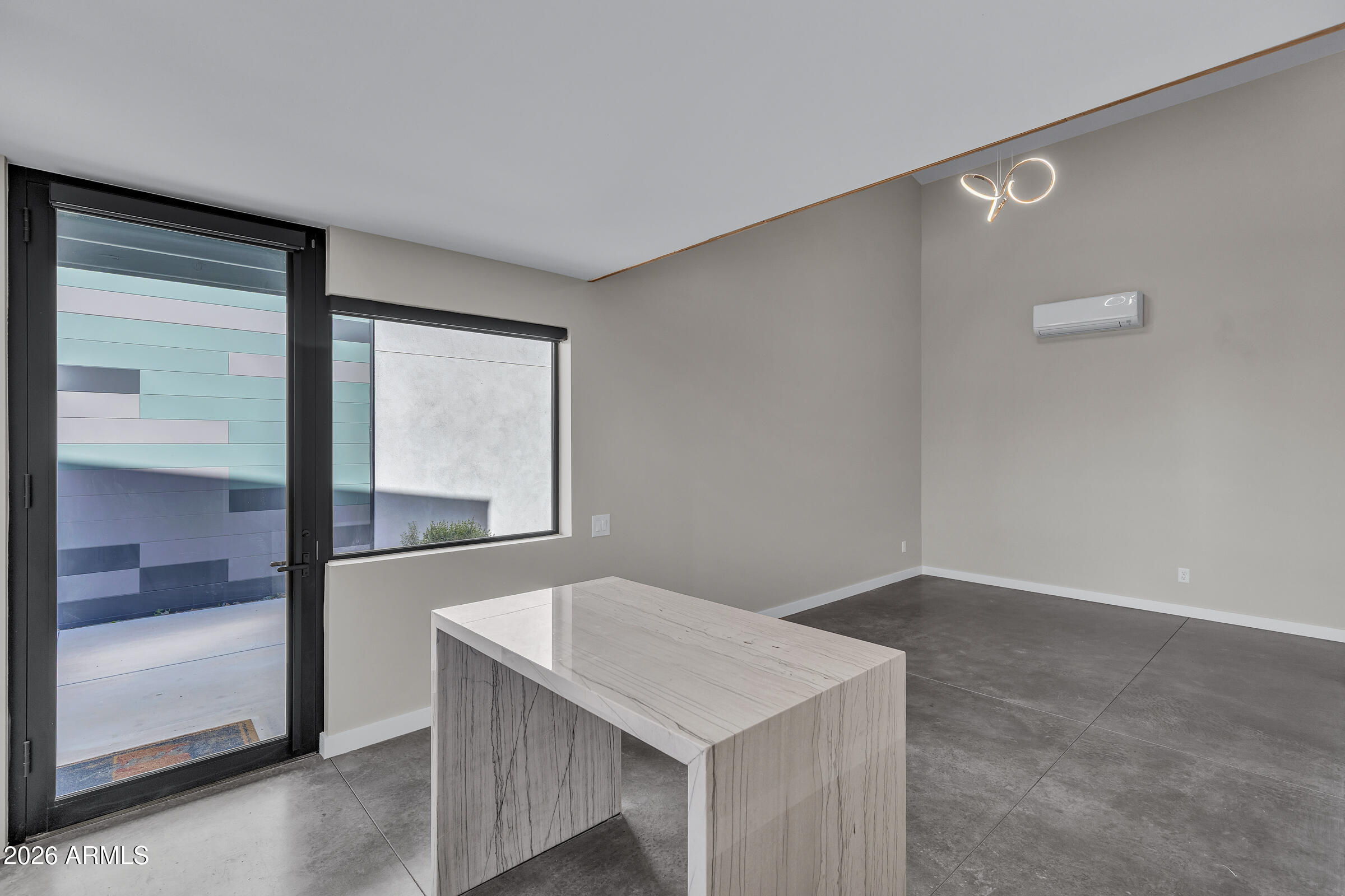 1491 South Rita Lane Tempe, AZ 85281 - Photo 5 of 15 a kitchen with a wooden floor and window