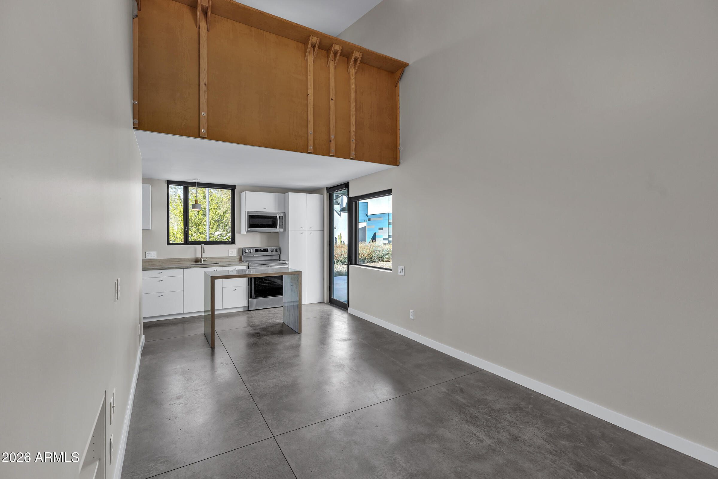 1491 South Rita Lane Tempe, AZ 85281 - Photo 8 of 15 a view of kitchen with table and chairs