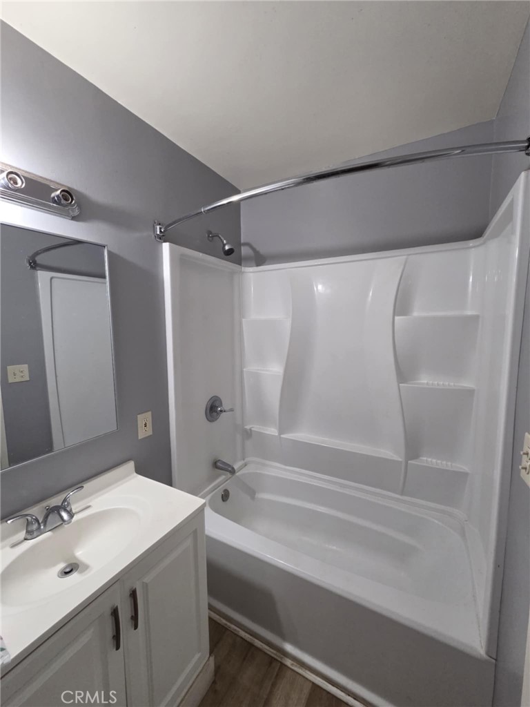 7072 Kermore Lane Stanton, CA 90680 - Photo 11 of 24 a bathroom with a bathtub and a sink