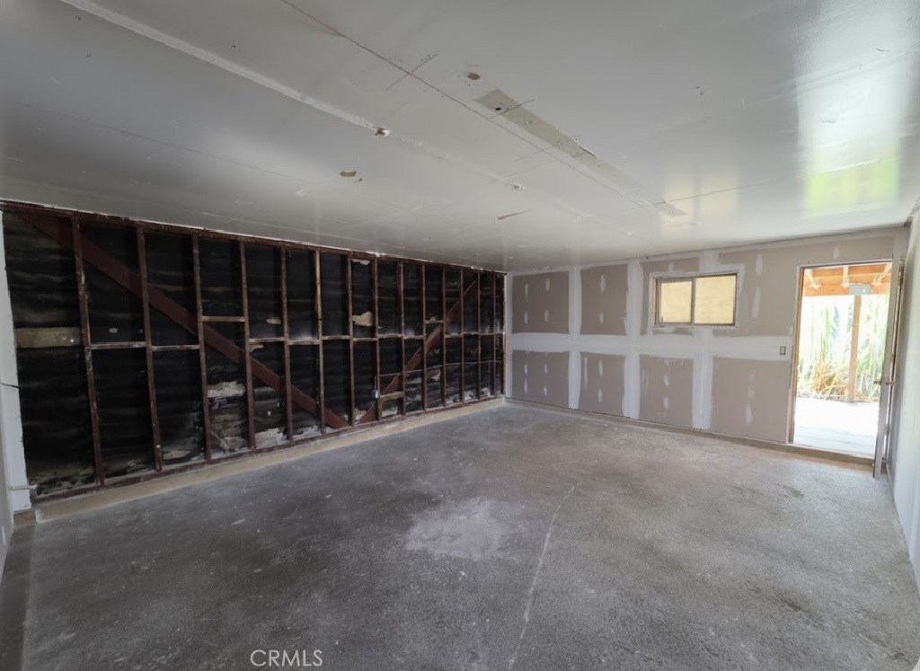 7072 Kermore Lane Stanton, CA 90680 - Photo 19 of 24 a view of an empty room with a window