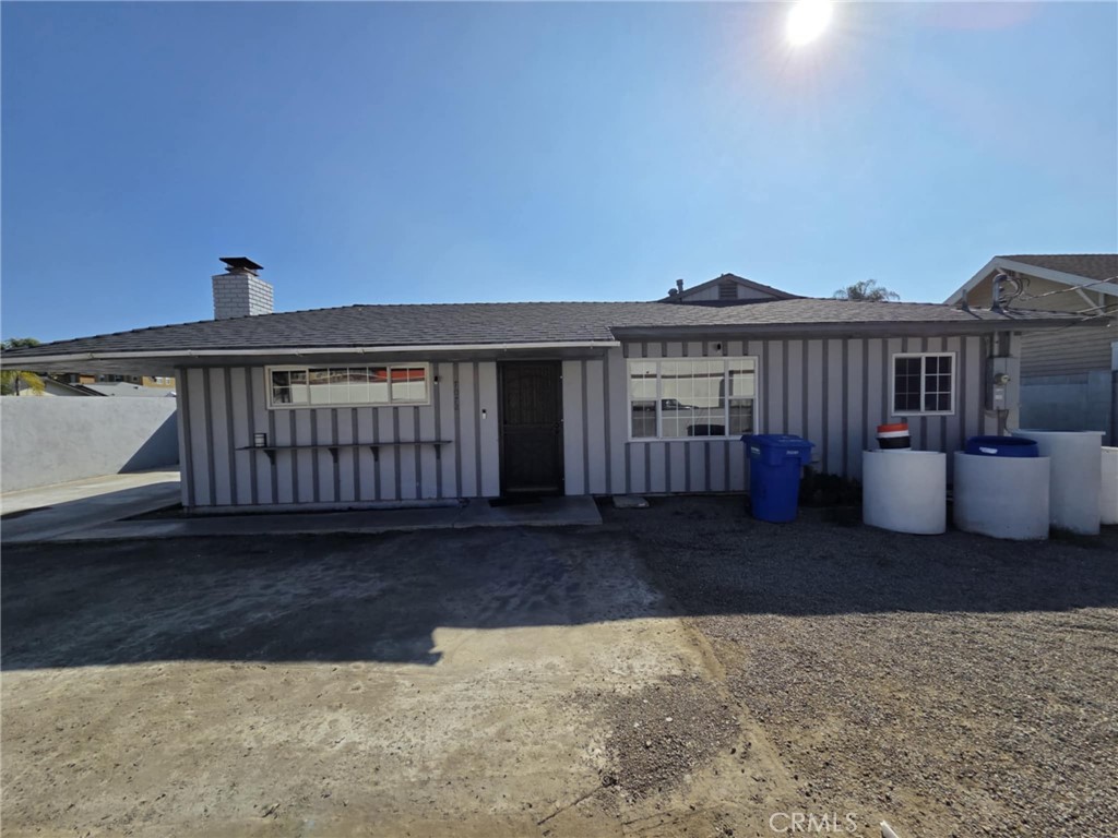 7072 Kermore Lane Stanton, CA 90680 - Photo 2 of 24 a view of a house with a yard