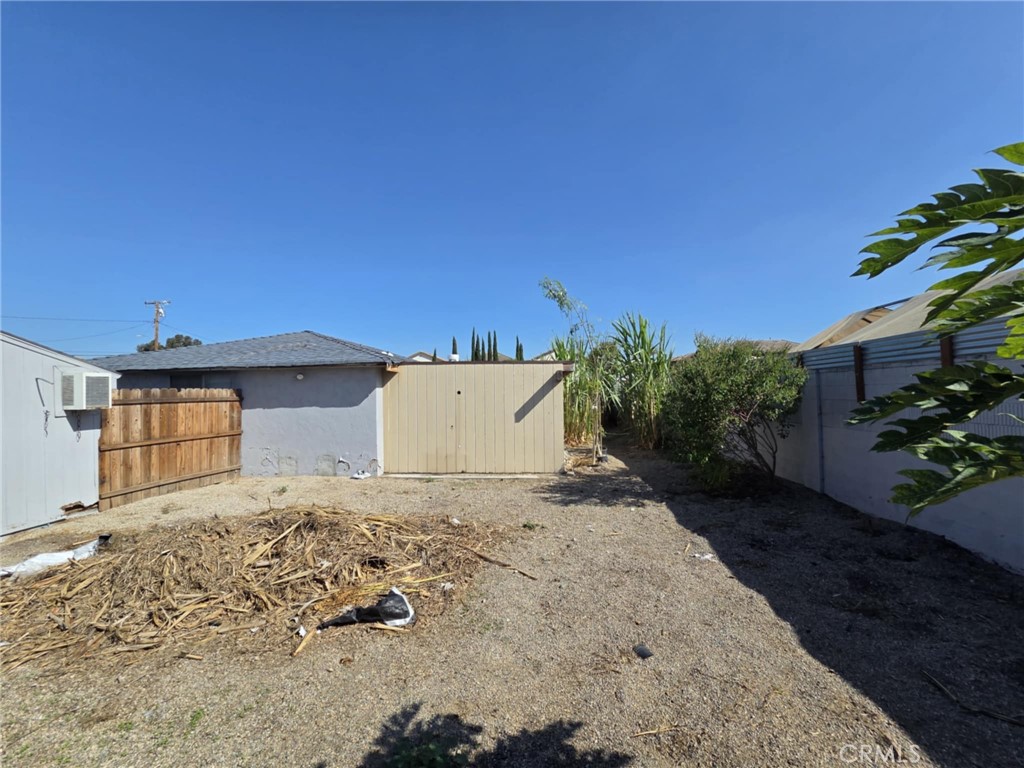 7072 Kermore Lane Stanton, CA 90680 - Photo 24 of 24 a view of a yard with a house